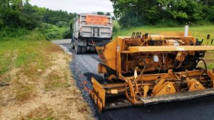 Machinery paving driveway